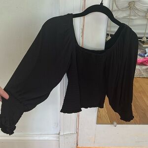Black, tight in the stomach/chest, loose in arms, square neck Anthropologie Top